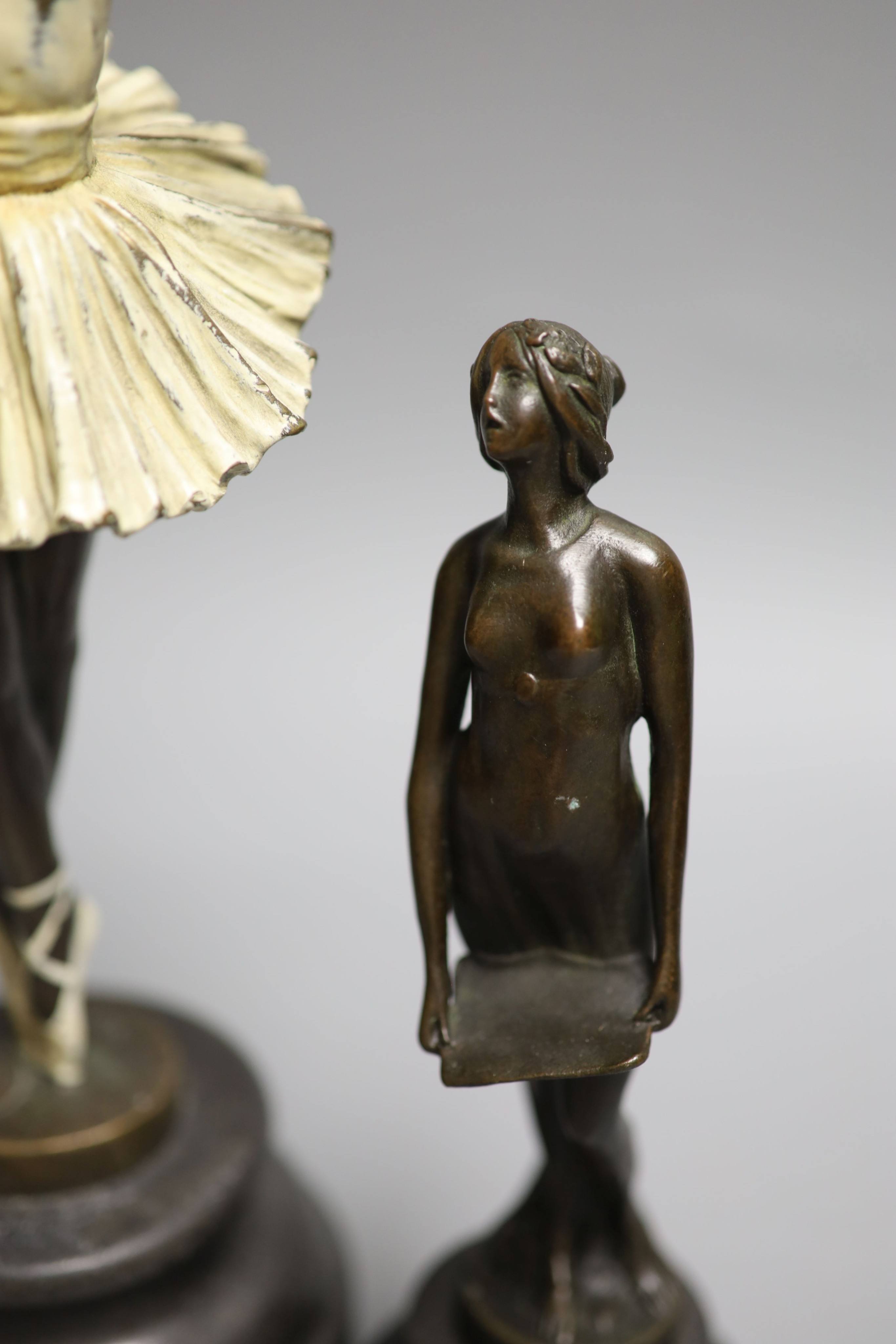 Two bronze figures of a ballerina and a nude maiden